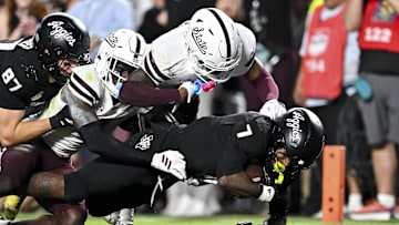 Oct 4, 2025; College Station, Texas, USA; Texas A&M Aggies wide receiver KC Concepcion (7) runs the ball in for a touchdown during the second half against the Mississippi State Bulldogs at Kyle Field. Mandatory Credit: Maria Lysaker-Imagn Images 