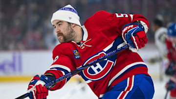 Nov 23, 2024; Montreal, Quebec, CAN; Montreal Canadiens defenseman David Savard (58) looks on wearing a Hockey fights cancer tuque during warm-up before the game against the Las Vegas Golden Knights at Bell Centre. Mandatory Credit: David Kirouac-Imagn Images