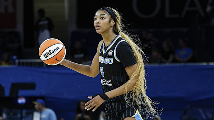 Chicago Sky forward Angel Reese controls the ball against the Minnesota Lynx. Chicago Sky forward Angel Reese controls the ball against the Minnesota Lynx.