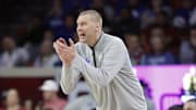 Feb 26, 2025; Norman, Oklahoma, USA; Kentucky Wildcats head coach Mark Pope gestures to his team during a play against the Oklahoma Sooners during the second half at Lloyd Noble Center. Mandatory Credit: Alonzo Adams-Imagn Images