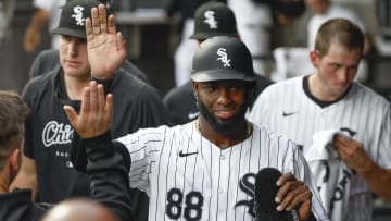 Jun 25, 2024; Chicago, Illinois, USA; Chicago White Sox outfielder Luis Robert Jr. (88) celebrates with teammates after scoring against the Los Angeles Dodgers during the first inning at Guaranteed Rate Field. Mandatory Credit: Kamil Krzaczynski-USA TODAY Sports