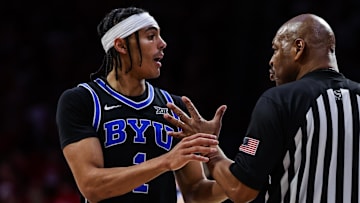Feb 22, 2025; Tucson, Arizona, USA; BYU Cougars guard Trey Stewart (1) talks with the referee after he threw the ball at Arizona Wildcats head coach Tommy Lloyd by accident during the second half at McKale Center. Mandatory Credit: Aryanna Frank-Imagn Images