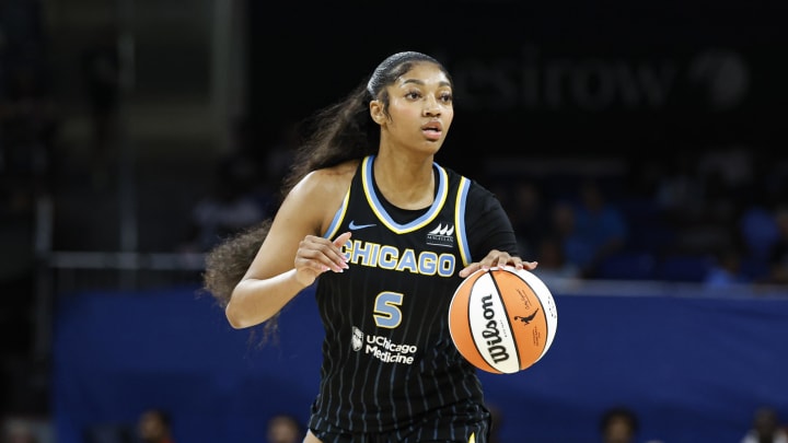 Aug 25, 2024; Chicago, Illinois, USA; Chicago Sky forward Angel Reese (5) looks to pass the ball against the Las Vegas Aces during the first half at Wintrust Arena. Mandatory Credit: Kamil Krzaczynski-USA TODAY Sports