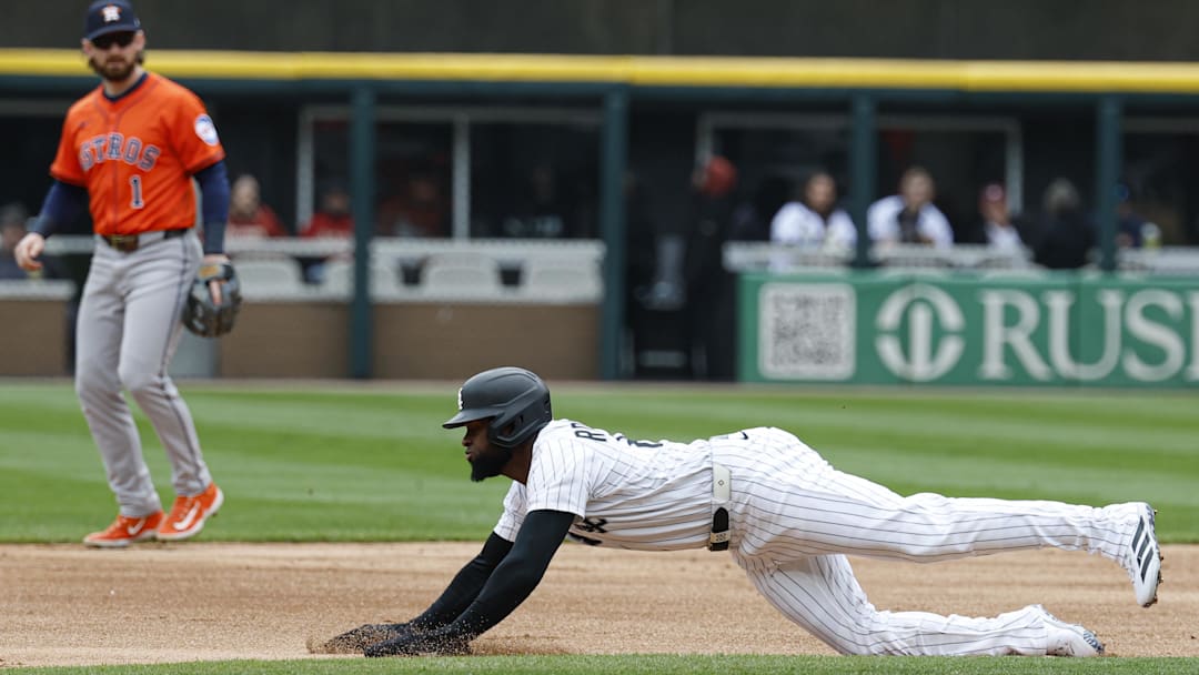  Chicago White Sox center fielder Luis Robert Jr. (88) slides to steal second base against the Houston Astros during the first inning at Rate Field in Chicago on May 4, 2025.
