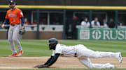  Chicago White Sox center fielder Luis Robert Jr. (88) slides to steal second base against the Houston Astros during the first inning at Rate Field in Chicago on May 4, 2025.