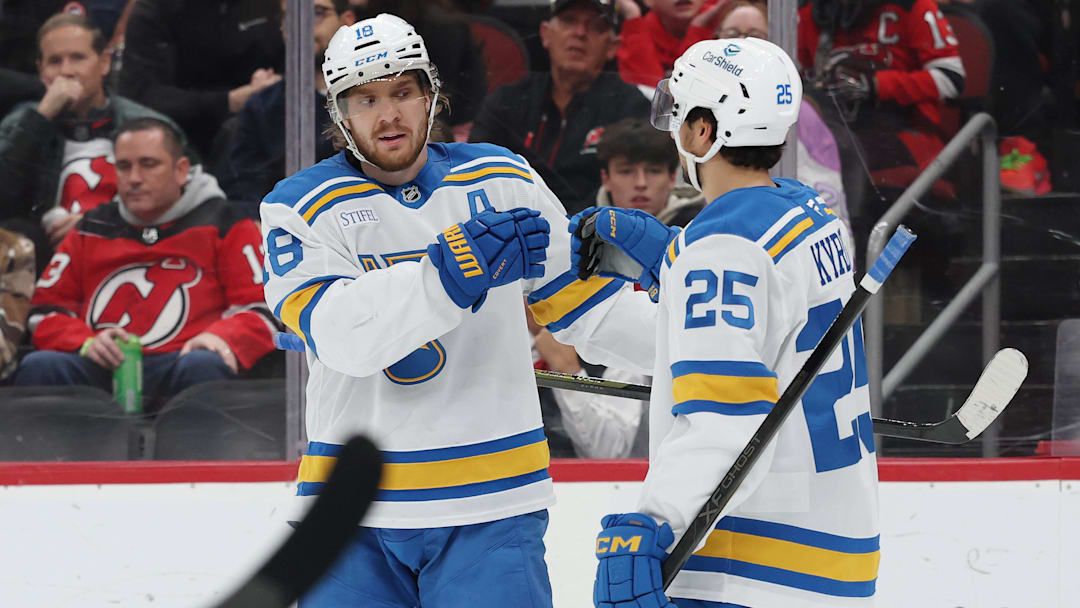 Nov 26, 2025; Newark, New Jersey, USA; St. Louis Blues center Robert Thomas (18) celebrates his goal against the New Jersey Devils during the first period at Prudential Center. Mandatory Credit: Ed Mulholland-Imagn Images Nov 26, 2025; Newark, New Jersey, USA; St. Louis Blues center Robert Thomas (18) celebrates his goal against the New Jersey Devils during the first period at Prudential Center. Mandatory Credit: Ed Mulholland-Imagn Images