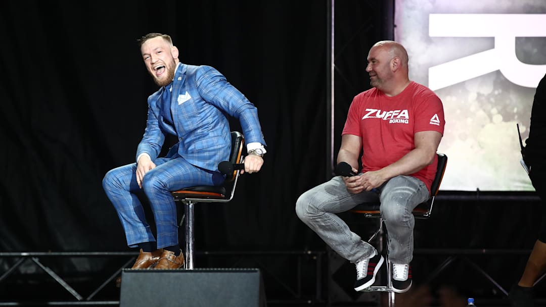 Conor McGregor sits near UFC president Dana White during a world tour press conference to promote the upcoming Mayweather vs McGregor boxing fight at Budweiser Stage on July 12, 2017. Conor McGregor sits near UFC president Dana White during a world tour press conference to promote the upcoming Mayweather vs McGregor boxing fight at Budweiser Stage on July 12, 2017.