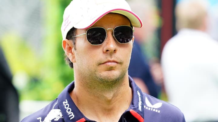 May 5, 2024; Miami Gardens, Florida, USA; Red Bull Racing driver Sergio Perez (11) arrives in the paddock before the Miami Grand Prix at Miami International Autodrome. Mandatory Credit: John David Mercer-USA TODAY Sports