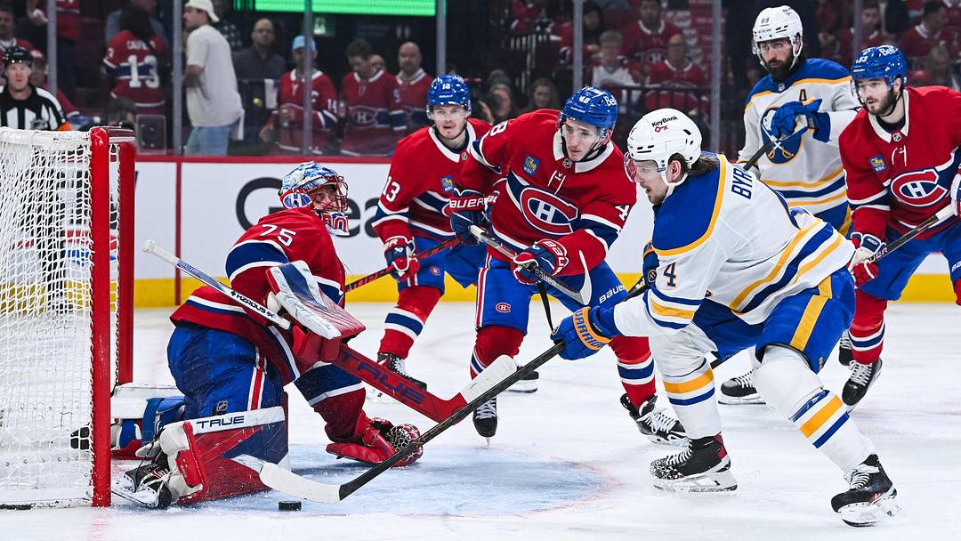 May 16, 2026; Montreal, Quebec, CAN; Montreal Canadiens goalie Jakub Dobes (75) makes a save against Buffalo Sabres defenseman Bowen Byram (4) during the second period in game six of the second round of the 2026 Stanley Cup Playoffs at Bell Centre. Mandatory Credit: David Kirouac-Imagn Images