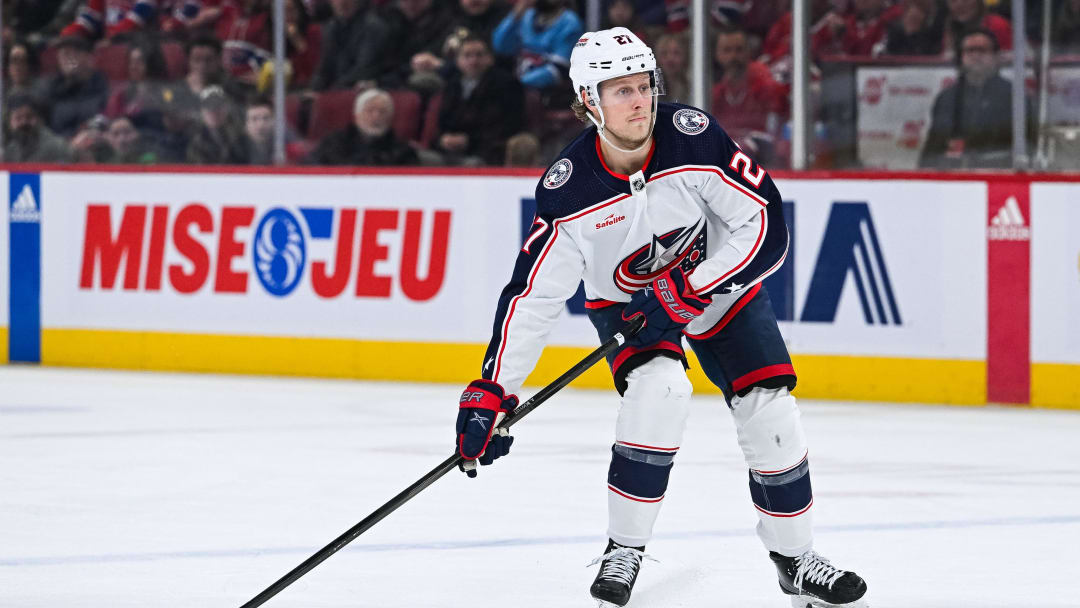Mar 12, 2024; Montreal, Quebec, CAN; Columbus Blue Jackets defenseman Adam Boqvist (27) plays the puck against the Montreal Canadiens during the second period at Bell Centre. Mandatory Credit: David Kirouac-USA TODAY Sports