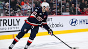 Feb 13, 2025; Montreal, Quebec, CAN; [Imagn Images direct customers only] Team USA forward Auston Matthews (34) plays the puck against Team Finland in the second period during a 4 Nations Face-Off ice hockey game at Bell Centre. Mandatory Credit: David Kirouac-Imagn Images
