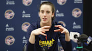 Jun 23, 2024; Chicago, Illinois, USA; Indiana Fever guard Caitlin Clark (22) speaks during a press conference before a game against the Chicago Sky at Wintrust Arena. Mandatory Credit: Kamil Krzaczynski-Imagn Images