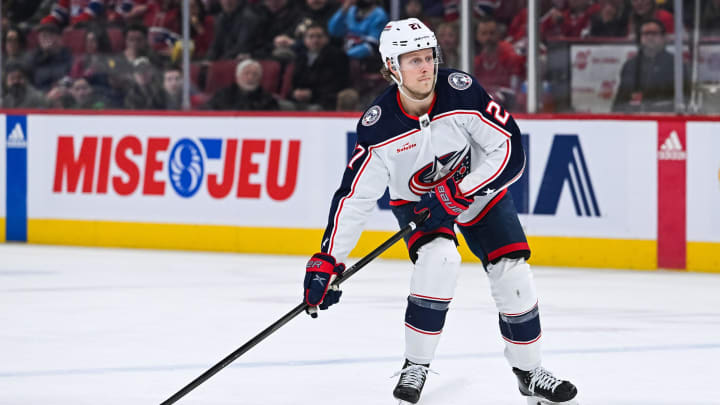 Mar 12, 2024; Montreal, Quebec, CAN; Columbus Blue Jackets defenseman Adam Boqvist (27) plays the puck against the Montreal Canadiens during the second period at Bell Centre. Mandatory Credit: David Kirouac-USA TODAY Sports