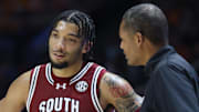 Mar 8, 2025; Knoxville, Tennessee, USA; South Carolina Gamecocks guard Jacobi Wright (1) speaks with head coach Lamont Paris during the first half against the Tennessee Volunteers at Thompson-Boling Arena at Food City Center. Mandatory Credit: Randy Sartin-Imagn Images
