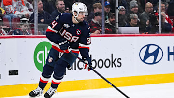 Feb 13, 2025; Montreal, Quebec, CAN; [Imagn Images direct customers only] Team USA forward Auston Matthews (34) plays the puck against Team Finland in the second period during a 4 Nations Face-Off ice hockey game at Bell Centre. Mandatory Credit: David Kirouac-Imagn Images