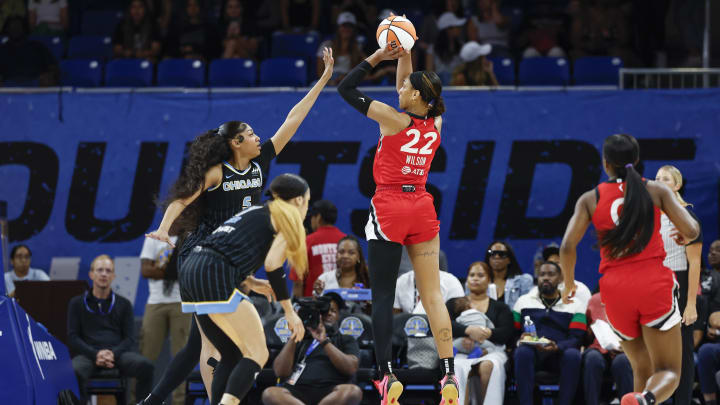 Las Vegas Aces center A'ja Wilson shoots against Chicago Sky forward Angel Reese 