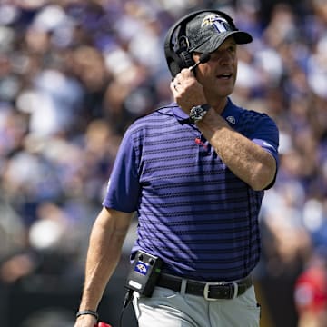 Sep 15, 2024; Baltimore, Maryland, USA;  Baltimore Ravens head coach John Harbaugh speaks with an official during  the first half against the Las Vegas Raiders at M&T Bank Stadium. Mandatory Credit: Tommy Gilligan-Imagn Images