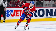 Apr 14, 2025; Montreal, Quebec, CAN; Montreal Canadiens defenseman Lane Hutson (48) plays the puck against the Chicago Blackhawks in the second period at Bell Centre. Mandatory Credit: David Kirouac-Imagn Images