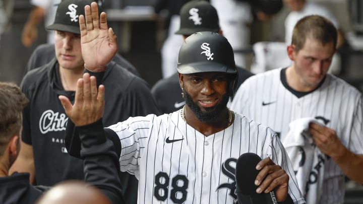 Jun 25, 2024; Chicago, Illinois, USA; Chicago White Sox outfielder Luis Robert Jr. (88) celebrates with teammates after scoring against the Los Angeles Dodgers during the first inning at Guaranteed Rate Field.