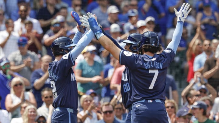 Aug 2, 2024; Chicago, Illinois, USA; Chicago Cubs catcher Christian Bethancourt (60) celebrates with shortstop Dansby Swanson (7) and outfielder Pete Crow-Armstrong (52) after hitting a three run home run against the St. Louis Cardinals during the second inning at Wrigley Field.