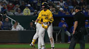 March 19, 2024; Kansas City, Missouri, USA; Missouri Tigers shortstop Jackson Lovich celebrates a run against the Kansas Jayhawks at Kauffman Stadium.