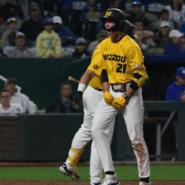 March 19, 2024; Kansas City, Missouri, USA; Missouri Tigers shortstop Jackson Lovich celebrates a run against the Kansas Jayhawks at Kauffman Stadium.