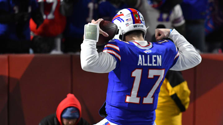 Jan 15, 2024; Orchard Park, New York, USA; Buffalo Bills quarterback Josh Allen (17) celebrates a touch down in the first half against the Pittsburgh Steelers in a 2024 AFC wild card game at Highmark Stadium. Mandatory Credit: Mark Konezny-USA TODAY Sports