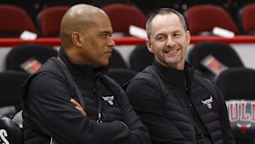 Apr 22, 2022; Chicago, Illinois, USA; Chicago Bulls executive vice president of basketball operations Arturas Karnisovas (right) talks with general manager Marc Eversley (left) before game three of the first round for the 2022 NBA playoffs against the Milwaukee Bucks at United Center. Mandatory Credit: Kamil Krzaczynski-Imagn Images