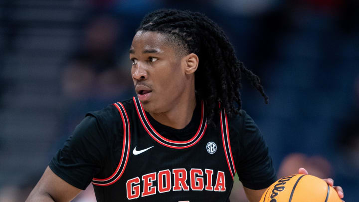 Georgia Bulldogs guard Silas Demary Jr. (4) heads up court against Florida during their second round game of the SEC Men's Basketball Tournament at Bridgestone Arena in Nashville, Tenn., Thursday, March 14, 2024.