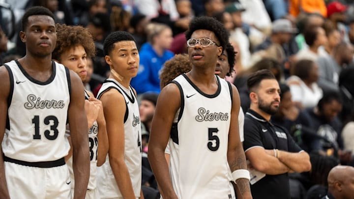 Bryce James, the son of NBA player LeBron James, stands with his teammates by the bench before the game between Sierra Canyon and Bartlett High School during Memphis Hoopfest. Bryce James, the son of NBA player LeBron James, stands with his teammates by the bench before the game between Sierra Canyon and Bartlett High School during Memphis Hoopfest.