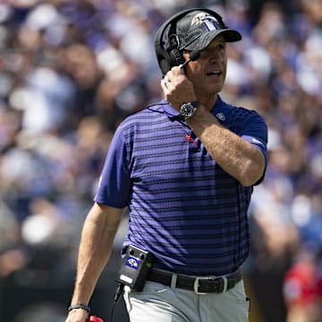 Sep 15, 2024; Baltimore, Maryland, USA;  Baltimore Ravens head coach John Harbaugh speaks with an official during the first half against the Las Vegas Raiders at M&T Bank Stadium. Mandatory Credit: Tommy Gilligan-Imagn Images