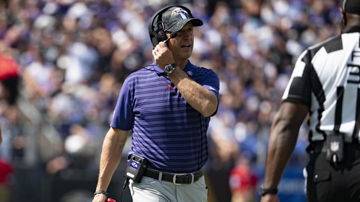 Sep 15, 2024; Baltimore, Maryland, USA;  Baltimore Ravens head coach John Harbaugh speaks with an official during the first half against the Las Vegas Raiders at M&T Bank Stadium. Mandatory Credit: Tommy Gilligan-Imagn Images