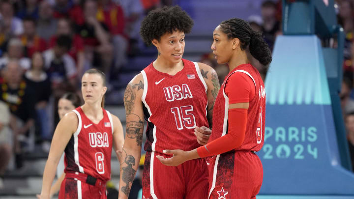 Aug 1, 2024; Villeneuve-d'Ascq, France; United States centre Brittney Griner (15) and forward A'Ja Wilson (9) react in the first half against Belgium in a women’s group stage game during the Paris 2024 Olympic Summer Games at Stade Pierre-Mauroy. Mandatory Credit: John David Mercer-USA TODAY Sports