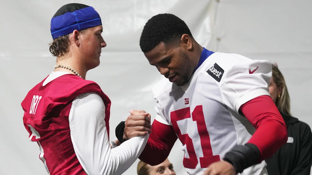 Eat Rutherford, NJ -- May 9, 2025 -- Jaxson Dart with Abdul Carter after Carter spoke to the media following practice at Giants Rookie Minicamp.
