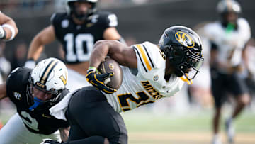 Missouri's running back Ahmad Hardy (29) runs against Vanderbilt's safety Randon Fontenette (2) during their game at FirstBank Stadium in Nashville, Tenn., Saturday, Oct. 25, 2025.