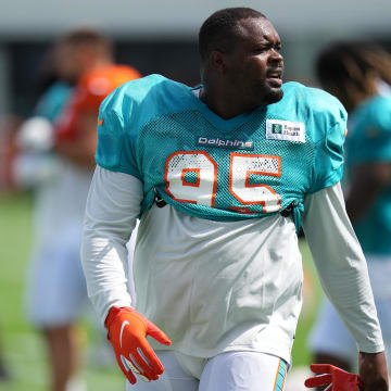 Miami Dolphins defensive tackle Benito Jones (95) warns up during his last training camp with the team in 2022.