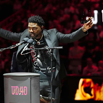 Jan 19, 2024; Miami, Florida, USA; Udonis Haslem speaks after his jersey was lifted to the rafters during the retirement ceremony during halftime of the game between the Miami Heat and the Atlanta Hawks Kaseya Center. Mandatory Credit: Jasen Vinlove-Imagn Images