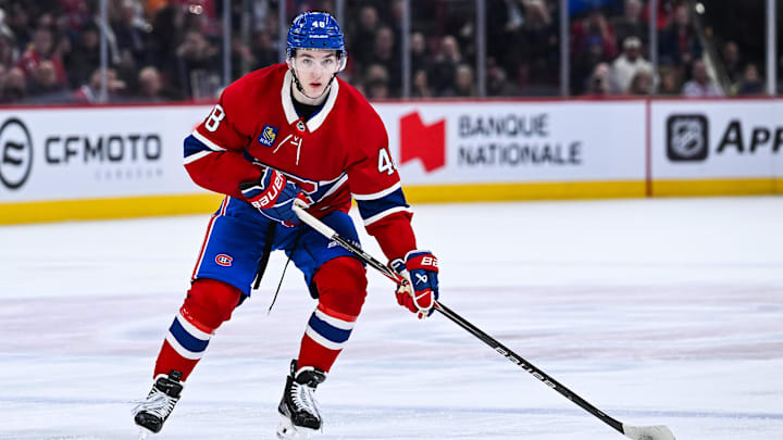 Feb 26, 2026; Montreal, Quebec, CAN; Montreal Canadiens defenseman Lane Hutson (48) plays the puck against the New York Islanders during the second period at Bell Centre. Mandatory Credit: David Kirouac-Imagn Images
