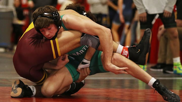 Mt Olive, NJ -- January 27, 2024 -- Chase Quenault of Delbarton won this 132 lb. semi-final, defeating Joshua Ortiz of Madison in the Morris County Wrestling Tournament held in Mt. Olive, NJ on January 27, 2024. Mt Olive, NJ -- January 27, 2024 -- Chase Quenault of Delbarton won this 132 lb. semi-final, defeating Joshua Ortiz of Madison in the Morris County Wrestling Tournament held in Mt. Olive, NJ on January 27, 2024.
