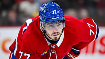 Feb 8, 2025; Montreal, Quebec, CAN; Montreal Canadiens center Kirby Dach (77) waits for a face-off against the New Jersey Devils during the second period at Bell Centre. Mandatory Credit: David Kirouac-Imagn Images