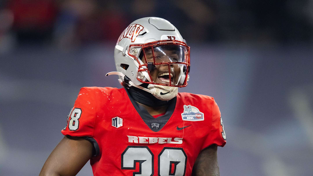 Dec 26, 2023; Phoenix, AZ, USA; UNLV Rebels linebacker Marsel McDuffie (38) against the Kansas Jayhawks in the Guaranteed Rate Bowl at Chase Field. Mandatory Credit: Mark J. Rebilas-USA TODAY Sports