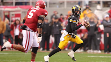 Nov 29, 2025; Fayetteville, Arkansas, USA; Missouri Tigers quarterback Beau Pribula (9) runs during the first quarter against the Arkansas Razorbacks at Donald W. Reynolds Razorback Stadium. Mandatory Credit: Nelson Chenault-Imagn Images