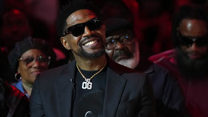 Jan 19, 2024; Miami, Florida, USA; Former Miami Heat player Udonis Haslem sits on the court for his jersey retirement ceremony during halftime of the game between the Miami Heat and the Atlanta Hawks Kaseya Center. Mandatory Credit: Jasen Vinlove-USA TODAY Sports