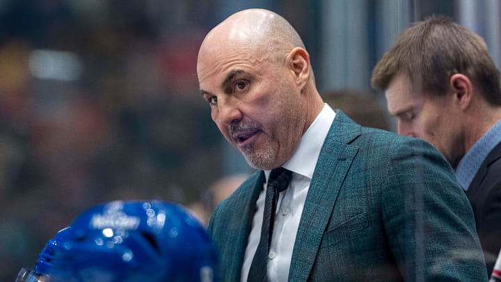 Vancouver Canucks head coach Rick Tocchet on the bench against the Calgary Flames. Vancouver Canucks head coach Rick Tocchet on the bench against the Calgary Flames.