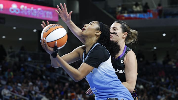 Sep 3, 2025; Chicago, Illinois, USA; Chicago Sky forward Angel Reese (5) drives to the basket against the Connecticut Sun during the second half at Wintrust Arena. Mandatory Credit: Kamil Krzaczynski-Imagn Images