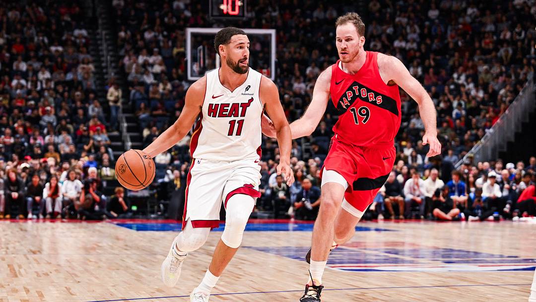 Oct 3, 2026; Quebec City, Quebec, CAN; Miami Heat guard Klay Thompson (11) dribbles the ball against Toronto Raptors center Jakob Poeltl (19) during the first quarter at Videotron Centre. Mandatory Credit: David Kirouac-Imagn Images Oct 3, 2026; Quebec City, Quebec, CAN; Miami Heat guard Klay Thompson (11) dribbles the ball against Toronto Raptors center Jakob Poeltl (19) during the first quarter at Videotron Centre. Mandatory Credit: David Kirouac-Imagn Images
