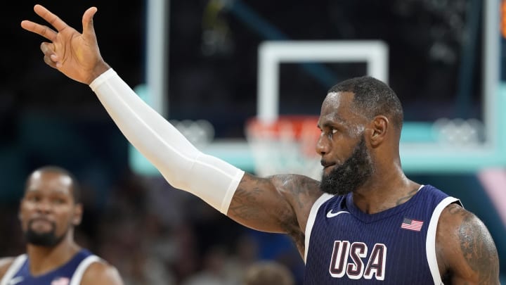 Jul 28, 2024; Villeneuve-d'Ascq, France; United States guard Lebron James (6) reacts after a play in the third quarter against Serbia during the Paris 2024 Olympic Summer Games at Stade Pierre-Mauroy. Mandatory Credit: John David Mercer-USA TODAY Sports