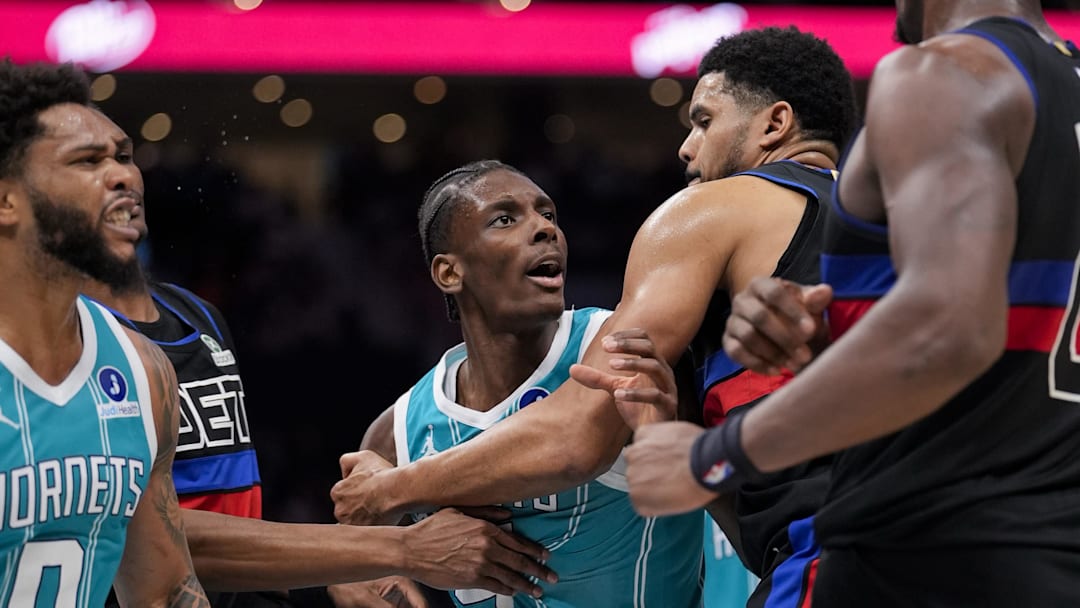 Feb 9, 2026; Charlotte, North Carolina, USA; Charlotte Hornets forward Miles Bridges (0) and forward Moussa Diabaté (14) get into a fight and would be ejected along with Detroit Pistons center Jalen Duren (0) and forward/center Isaiah Stewart (28) during the second half at Spectrum Center. Mandatory Credit: Jim Dedmon-Imagn Images
