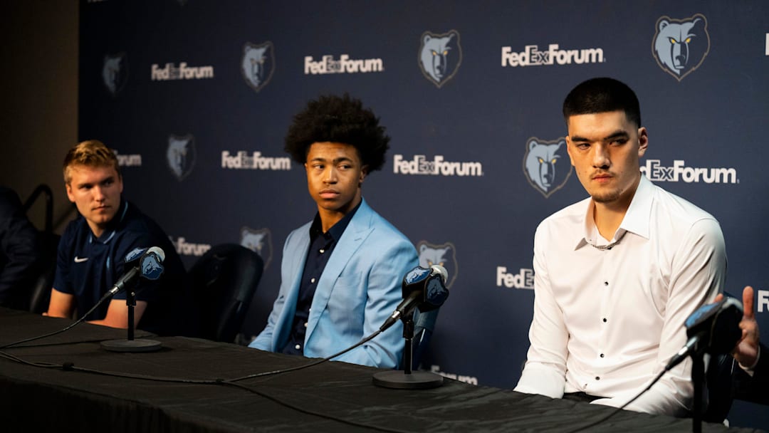 Grizzlies 2024 NBA Draft picks Cam Spencer, Jaylen Wells, and Zach Edey listen during a press conference to introduce the team’s picks at FedExForum on Friday, June 28, 2024.