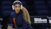 Jun 12, 2024; Chicago, Illinois, USA; Connecticut Sun guard DiJonai Carrington (21) warms up before a basketball game against the Chicago Sky at Wintrust Arena. 